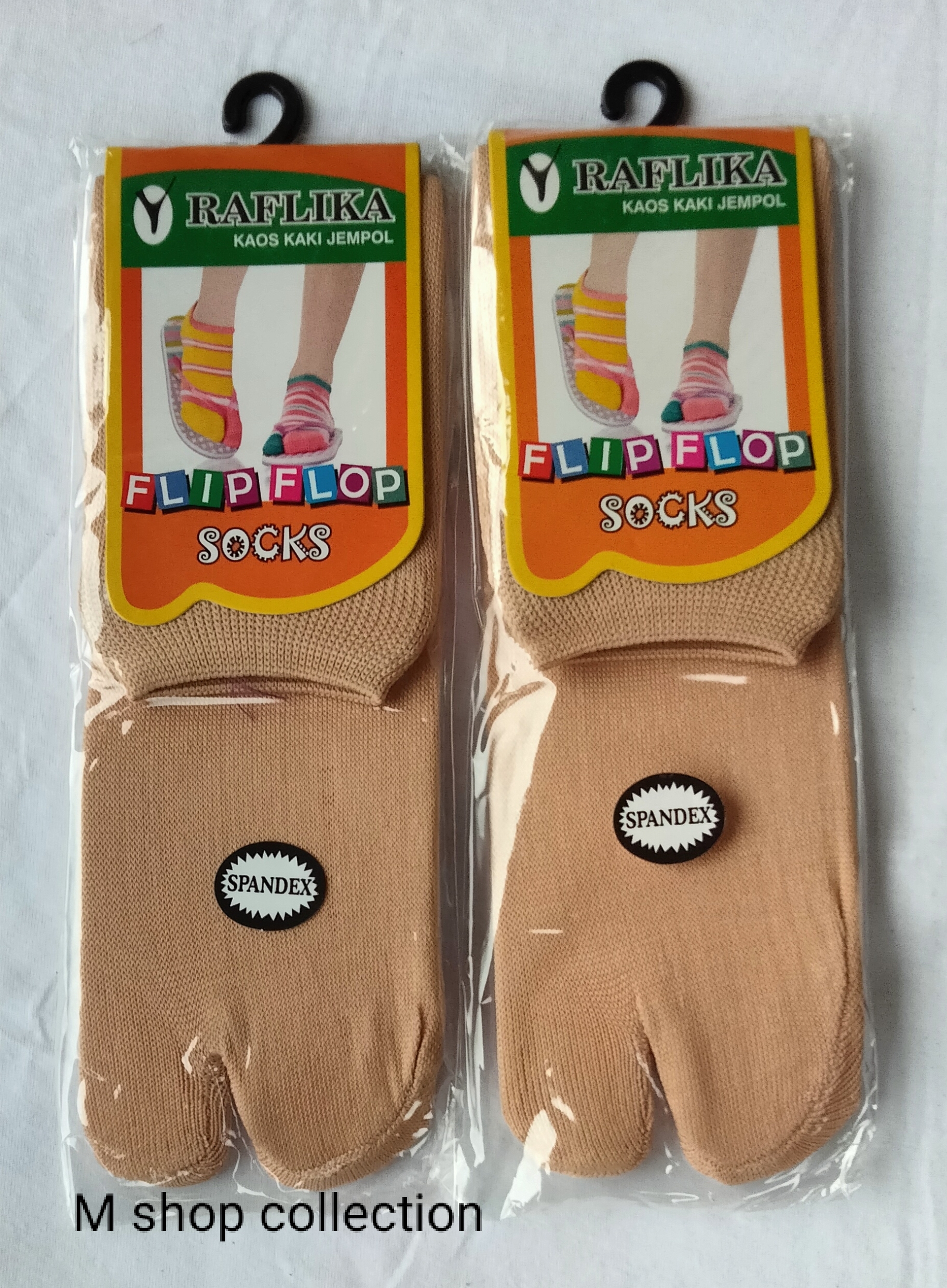 Kaos kaki jempol muslim