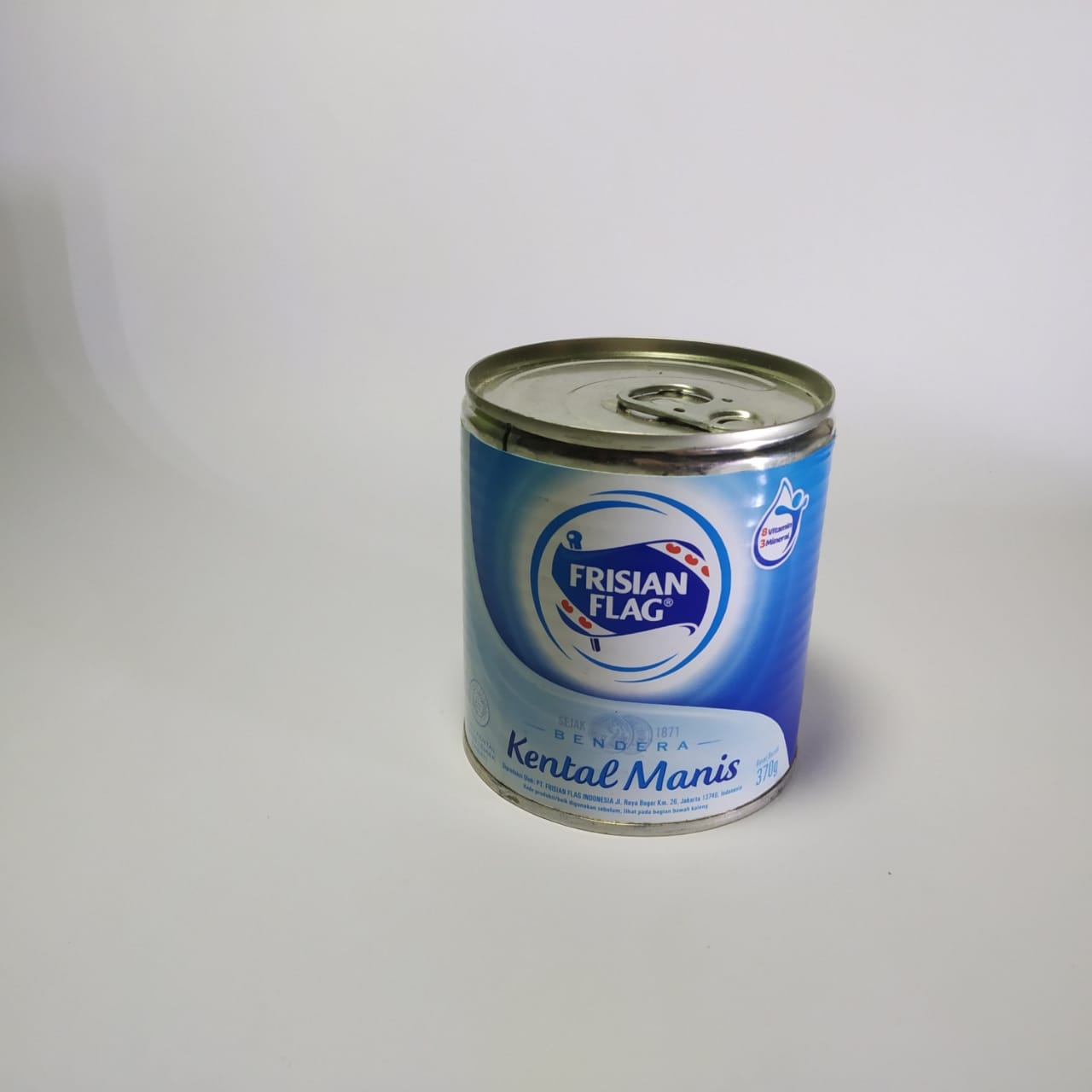 Frisian Flag kental manis putih kaleng