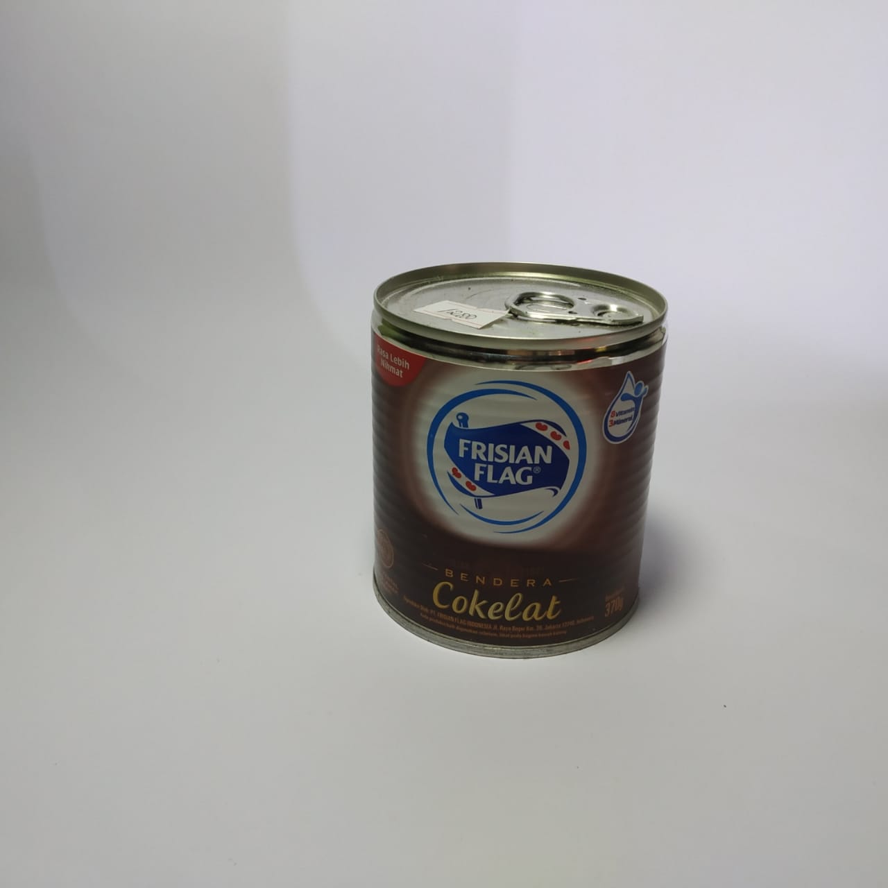 Frisian Flag kental manis cokelat kaleng