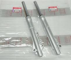 as shock depan + tabung R/L  HONDA Supra X-125